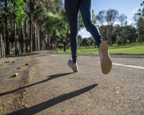 Middle aged man jogging in a park healthy lifestyle